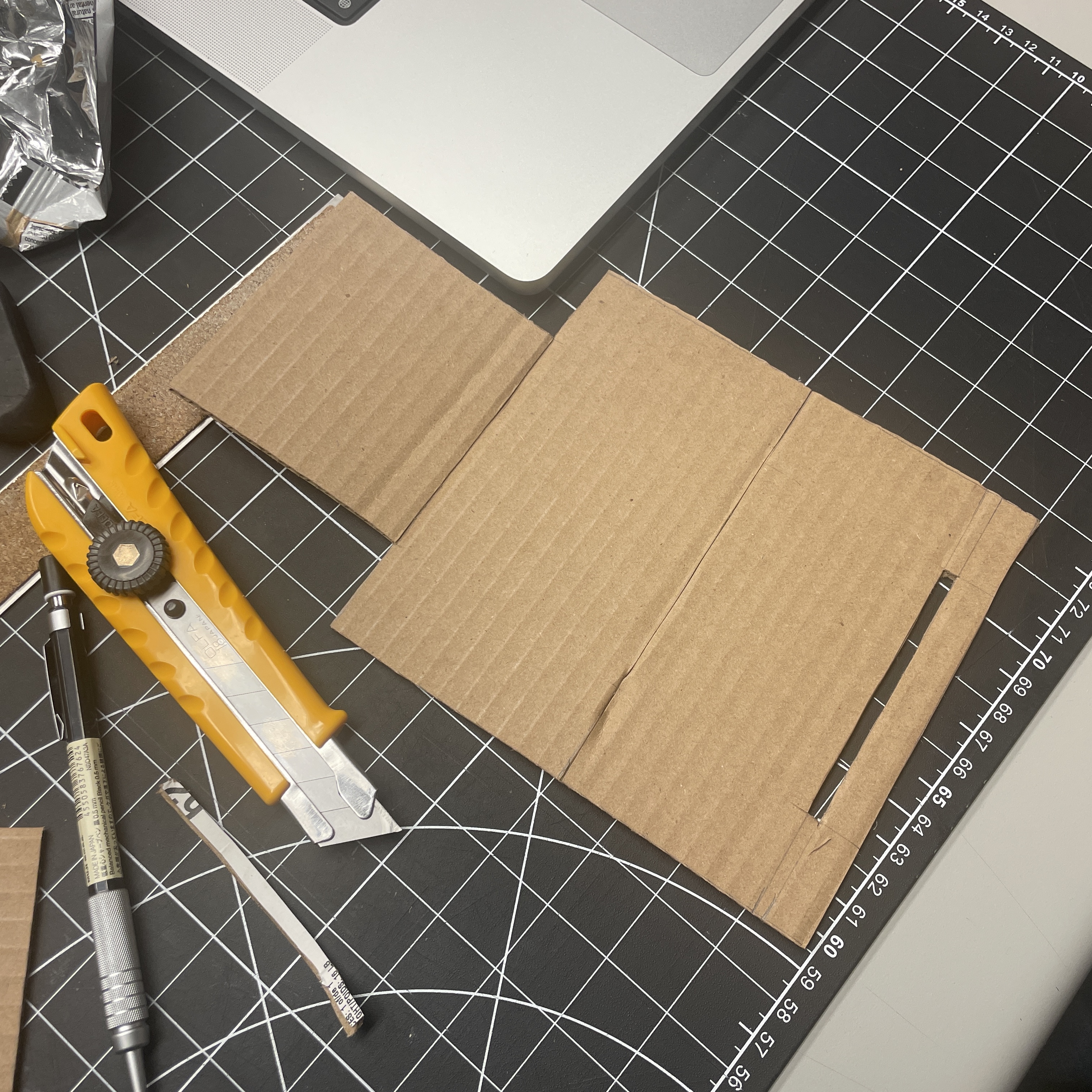 Using tutorials from class, my group and I practiced guerrilla prototyping techniques to create a cardboard prototype of a phone stand
